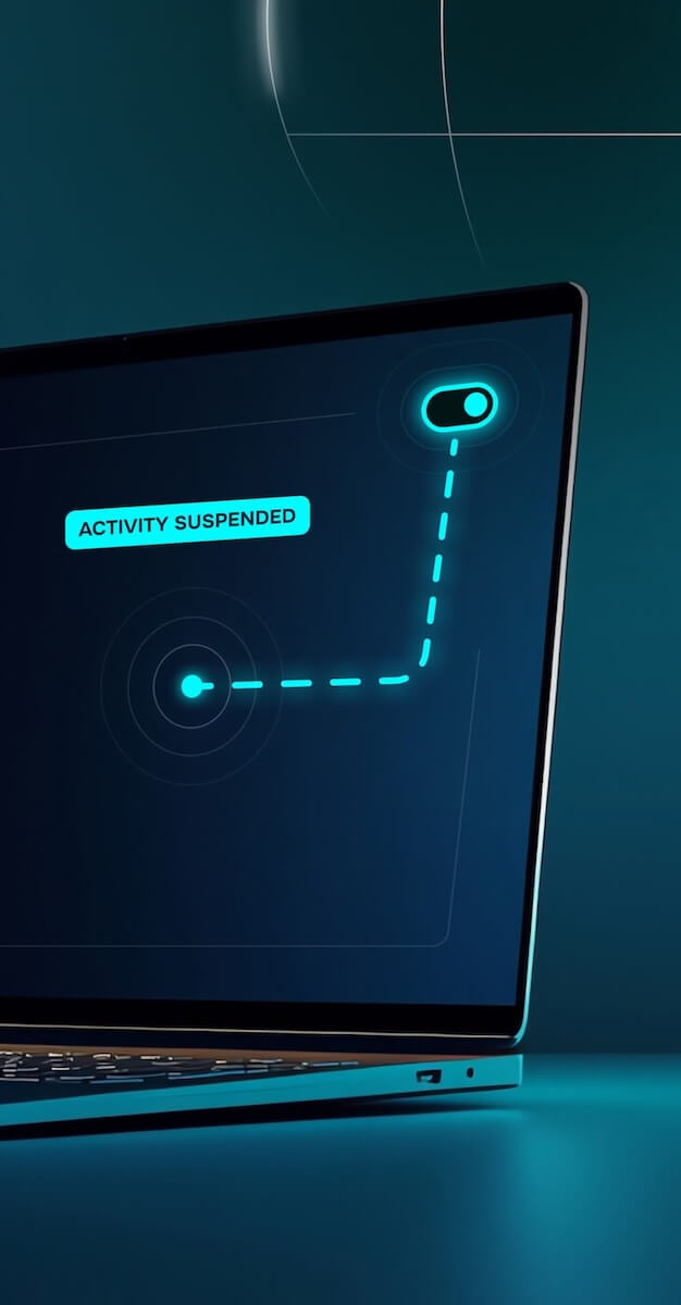 A closeup of a laptop. The screen is mostly blank, but it does have a label saying “Activity Suspended” and a dotted line leading to a toggle switch.